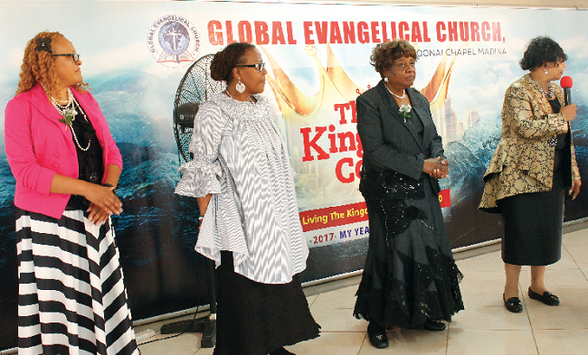 Rev. Mrs McLaughlin (with mic) introducing her team at the GEC Adonai Chapel, Madina