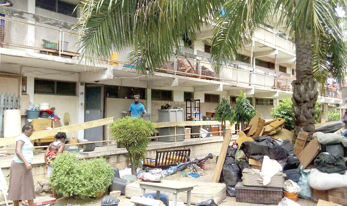 Occupants of Kaiser Flats in Tema Community Four have had their properties thrown out following an eviction exercise yesterday morning.  INSET:   Mr Richard Anning, the Assembly Member for the Horticulture Electoral Area and Spokesperson of the residents, speaking to journalists