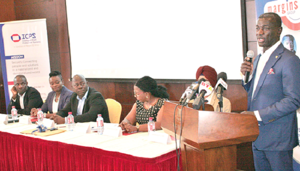 Mr Prince Kofi Amoabeng, Board Chairman, Enablis Ghana, addressing the participants. Looking on are Mr Amar Deep S. Hari (2nd right), Founder and Chief Executive Officer of IPMC, Mrs Shika Acolatse (3rd right), Country Director, Enablis Ghana, Mr Moses  Baiden (3rd left), C.E.O, Margins Group, Mrs Edith Dankwa (2nd left), C.E.O of B&FT, and Mr Frank Oye (left), Executive Director, Margins Group. Picture: INNOCENT K. OWUSU.