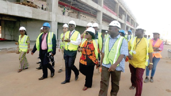 • Ms Cecilia Dapaah (middle) touring some of the facilities at GACL with members of the board of the company