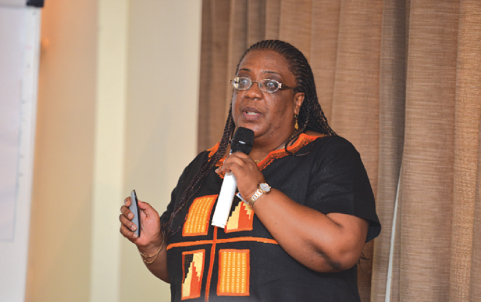 Dr Lydia Dsane-Selby, Director of Claims at the National Health Insurance Authority (NHIA) addressing some participants in the function