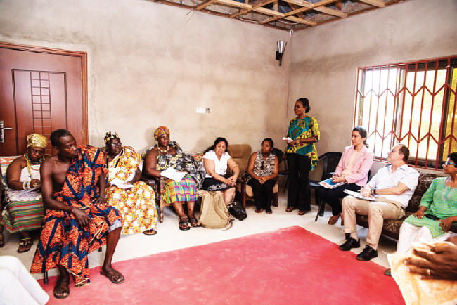 Torgbe Ayite Awaga IV (3rd left), Mama Ku-Agbi III of Fievie Traditional Area (left) and Mama Alorvi II of Dorfor Traditional Area (fourth left) interacting with the committee members