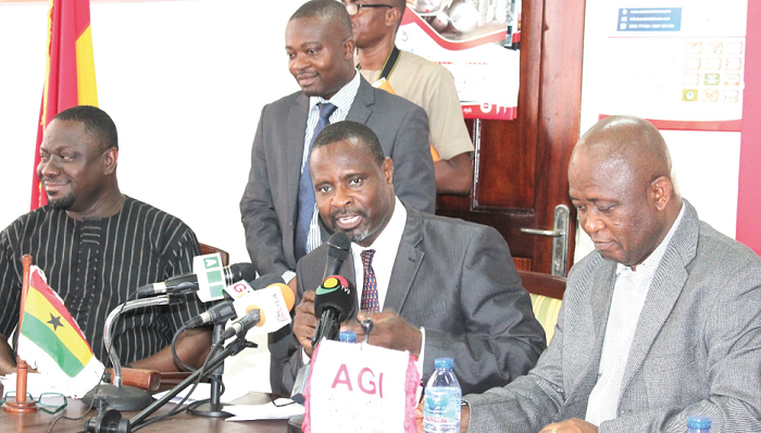  Mr James Asare-Adjei (middle), President, AGI, addressing the press conference. With him are Mr Humphrey Ayim Darkeh (left), Vice-President (Small Scale Industry), and Dr Yaw Adu-Gyamfi (right) Vice-President (Large Scale Industry), AGI. Picture: BENEDICT OBUOBI