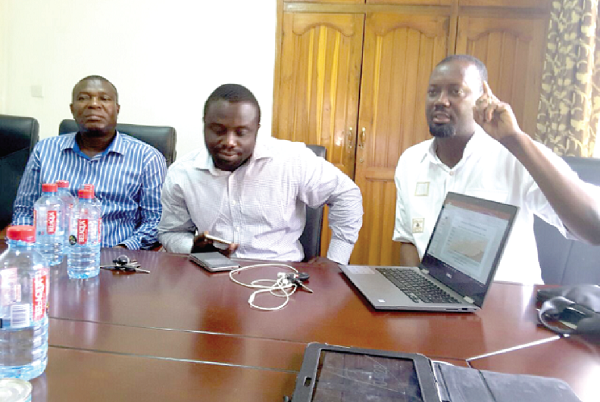  The General Secretary of GNASSM, Mr Godwin Armah (right), explaining a point during the media interaction. With him are some officials of the association