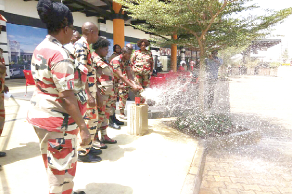  The LEKMA Fire Command testing the hydrant at the Nungua mall