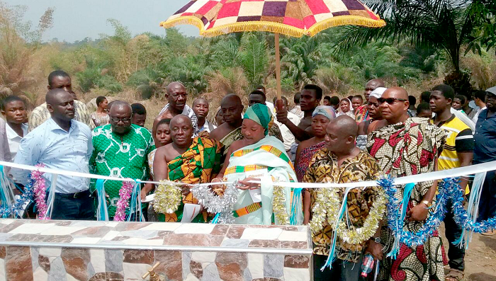 Nana Serwaa Bruwaa (arrowed), Akrokerrihemaa, inaugurating the water facility at the Asare Bediako SHS in Akrokerri
