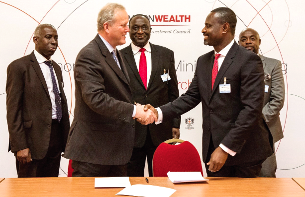 Mr James Asare-Adjei (2nd right) in a handshake with Lord Marland of Odstock. With them include Mr Alan Kyerematen