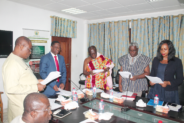  Mr John Peter Amewu (2nd left), the Minister of Lands and Natural Resources, swearing in some members of the Ministry of Lands and Natural Resources (MLNR) Advisory Board. Picture: Maxwell Ocloo