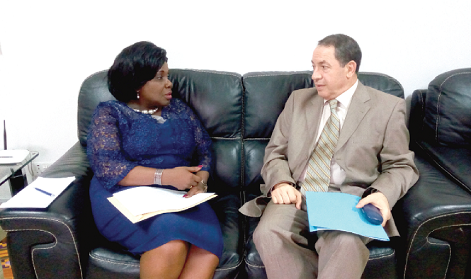  Mr Youssef Delileche discussing the draft air services agreement with Ms Cecilia Abena Dapaah