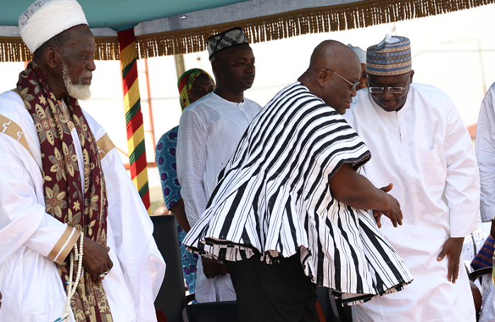   President Akufo-Addo exchanging pleasantries with Dr Alhaji Mahamudu Bawumia after the event. Looking on is Sheikh Dr Nuhu Sharubutu (left), the Chief Imam