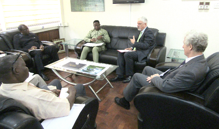 Mr William Hanna (arrowed), the Head of delegation of the European Union to Ghana, in a  conversation with some officials at the ministry