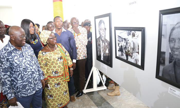  President Akufo-Addo together with Mrs Frema  Osei-Opare (2nd left), the Chief of Staff, observing some photographs of past heads of state and heroes of Ghana. Picture: SAMUEL TEI ADANO