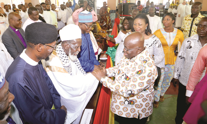  President Akufo-Addo shaking hands with Sheikh Nuhu Osman Sharabutu (2nd left), Chief Imam, at the ceremony.  Picture: SAMUEL TEI ADANO