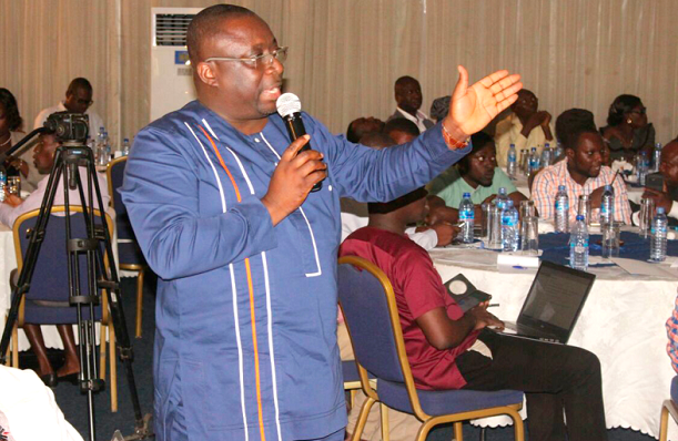 Mr George Asiedu, the Project Cordinator speaking at the review meeting