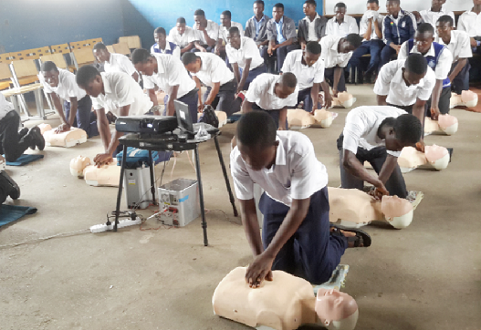 Some of the participants practising some of the life-saving techniques they have been taught