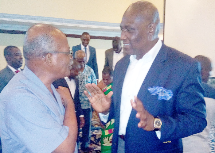 Mr Kenneth Kwamina Thompson (right) interacting with a participant after the event