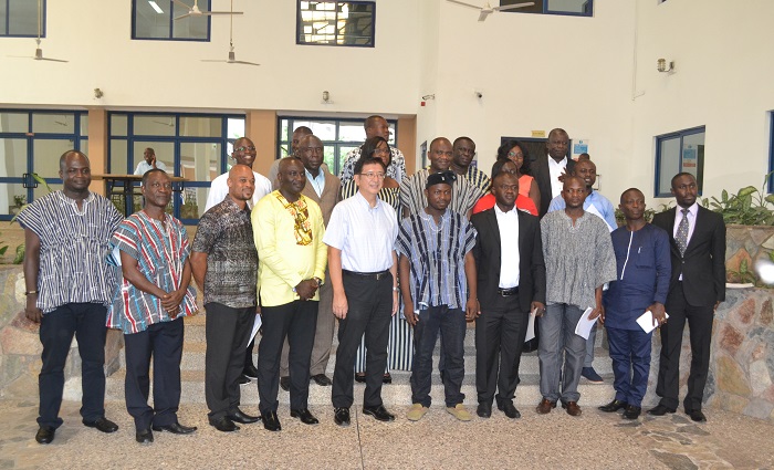 Mr Kaoru Yoshimura (left), Japanese Ambassador to Ghana in a group photograph with some of the recipients of the Kaizen champion enterprise award  in Accra. Picture: GABRIEL AHIABOR