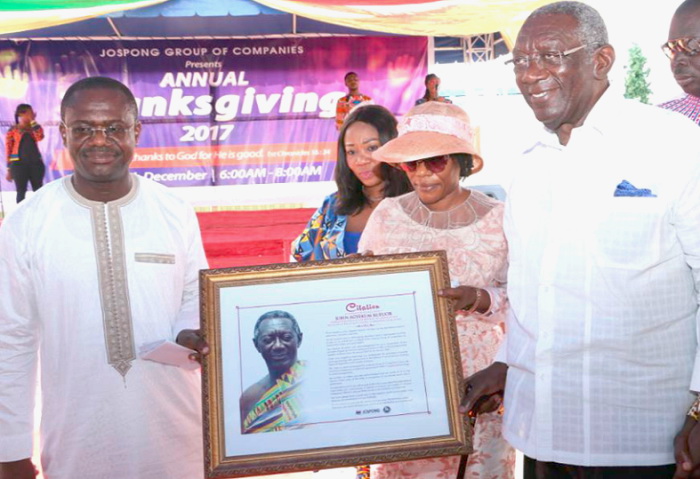 Mr Agyapong presenting to former President Kufuor citation at the ceremony