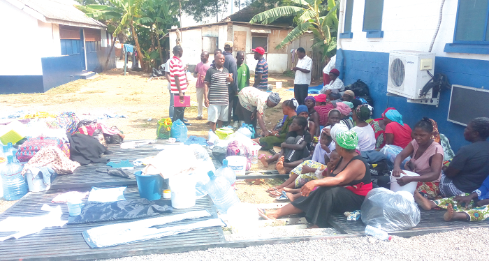 Some of the stranded Liberians at the Cantonments police station