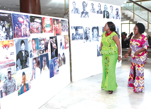 The Minister of Tourism, Arts amd Culture, Mrs Catherine Afeku with the Executive Director of National Theatre, Mrs Amy Appiah inspecting the exhibition at the theatre after the launch