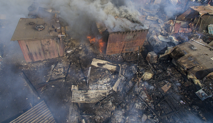  Some of the metal containers in flames. Picture: DOUGLAS ANANE-FRIMPONG