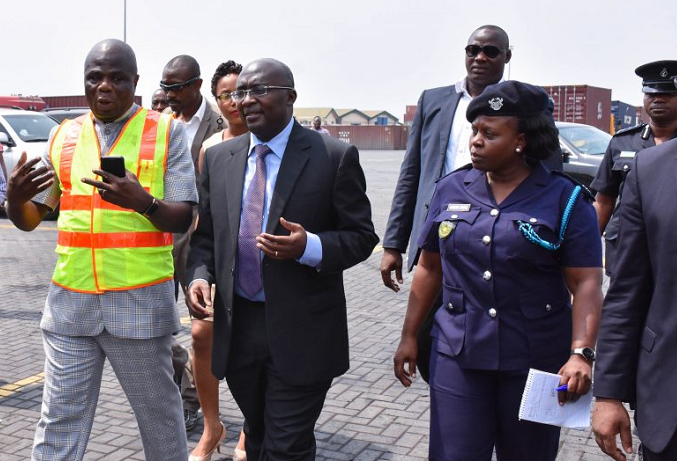 Mr Jacob Adorkor (in reflective jacket), the Director of Port, taking Dr Bawumia, the Vice-President, round the facility. Picture: Della Russel Ocloo