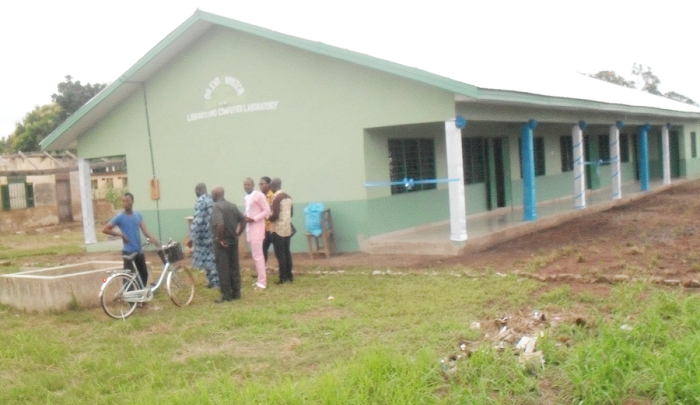 A team of invited guests inspecting the ICT and library facilities