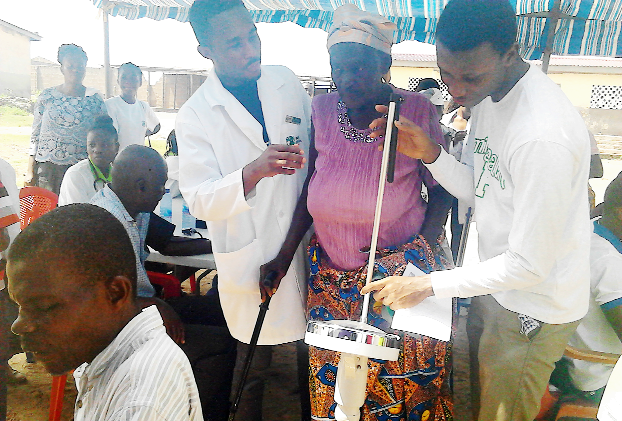 Medical students offering health screening to residents within the Teshie community and its environs in Accra