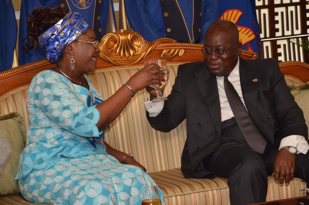 President Akufo-Addo in a toast with Mrs Martine Francoise Dossa (left), the Ambassador of Benin to Ghana