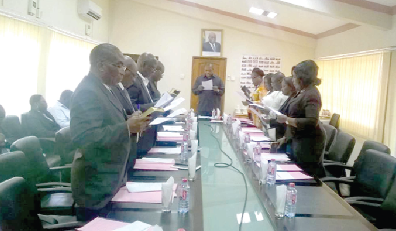 Dr Matthew Opoku Prempeh (head of the table), the Minister of Education, swearing in the governing council members