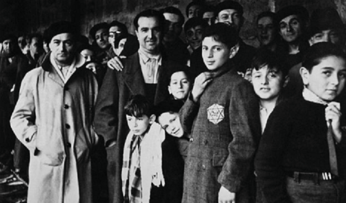• This photo taken in 1942 shows Jewish deportees in the Drancy transit camp before being sent to Auschwitz