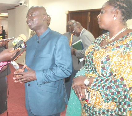 Mr Samuel Atta Akyea (2nd right), Minister of Works and Housing, explaining a point to some journalists after the meeting in Accra. With him is Ms Freda Prempeh (right), Deputy Minister of Works and Housing. Picture: EDNA ADU-SERWAA