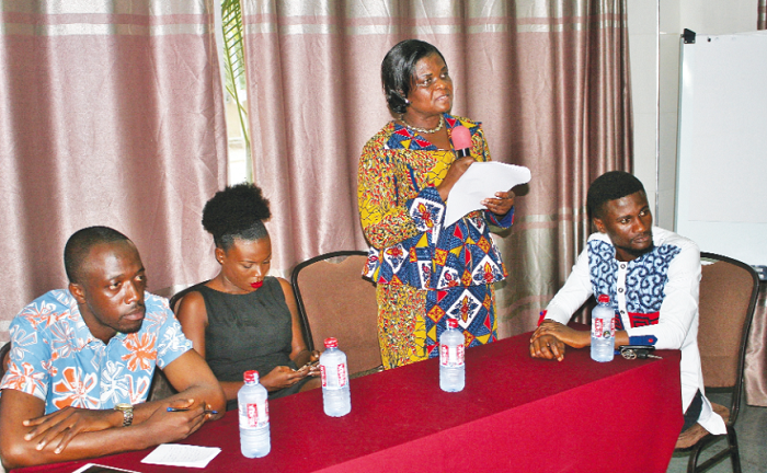 •  Mrs Malonin Asibi (2nd right), Senior Programme Officer of the Ministry of Gender, Children and Social Protection, addressing the participants. PICTURE: INNOCENT K. OWUSU.