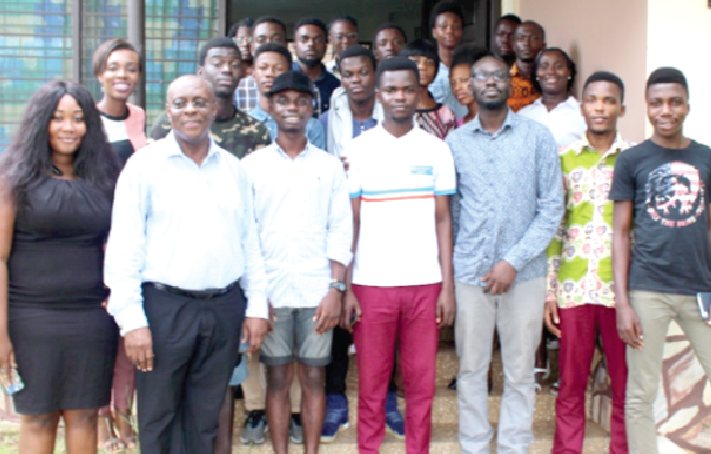 Mr Isaac Sackey, CEO of Learning Organisation (2nd left front row) in a group picture with some of the participants