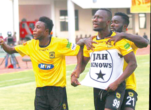 Kotoko’s Sadick Adams is joined by his teammates to celebrate his first goal in the MTN FA Cup final last