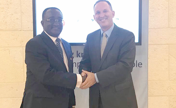 Ambassador Gil Haskel (right), Head of the MASHAV of Israel, and Dr Owusu Afriyie Akoto, the Minister of Food and Agriculture, after the meeting