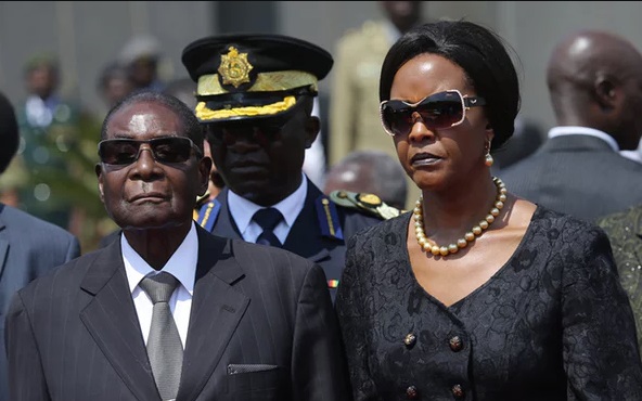 Robert Mugabe and his wife, Grace. The first lady is said to have once spent $75,000 on one shopping trip in Paris. Photograph: Aaron Ufumeli/EPA