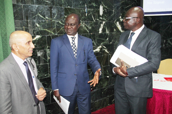  Prof. George Gyan-Baffour (2nd right),the Minister for Planning, explaining a point to Prof. Felix Ankomah Asante (right), Director of ISSER College of Humanities, University of Ghana, Legon and Mr Shashidhara Kolavalli (left), a Senior Research Fellow, Development Strategy and Governance, IFPRI after the ceremony. Picture: EDNA ADU-SERWAA