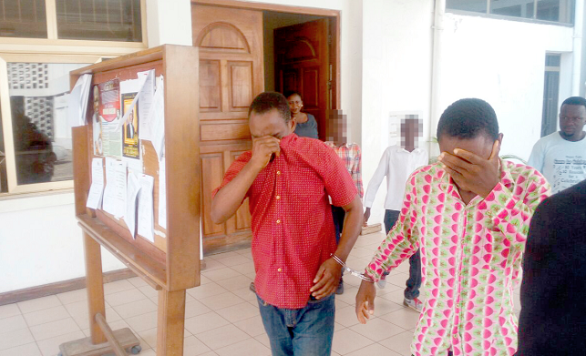 Ebenezer Tawiah (left) and Raymond Agbezuge leaving the court premises to serve their jail terms.Picture: EMMANUEL EBO HAWKSON