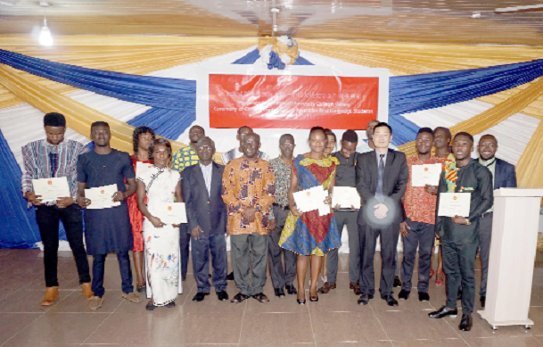 Mr Jiang Zhouteng (3rd right) and Professor Obeng Mireko (arrowed), Vice Chancellor of WIUC,  with the winners at the ceremony.