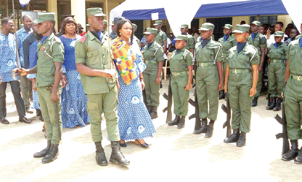  The Minister for Gender, Children and Social Protection, Ms Otiko Djaba inspecting the school cadet corps