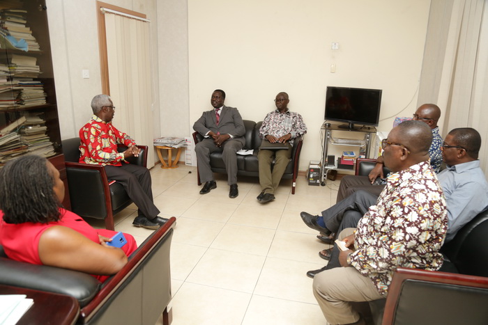 Mr Kingsley Inkoom (seated left), the acting Editor of the Daily Graphic, briefing Dr Adutwum and Professor Opoku-Amankwa (seated middle) while senior editors of the Editorial Conference look on 