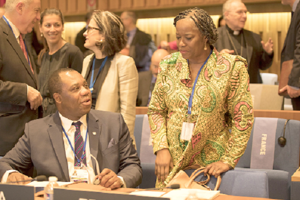 • Dr Opoku Prempeh, Minister of Education (seated), in a discussion with Ms Anna Bossman, Ghana's Ambassador to France and Permanent Delegate to UNESCO, during the event in Paris, France