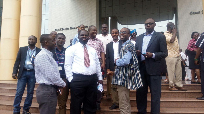Some of the ECG workers at the court premises