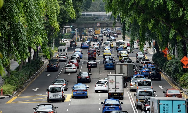 Motorists enter the financial district area in Singapore. Photograph: Roslan Rahman/AFP/Getty Images