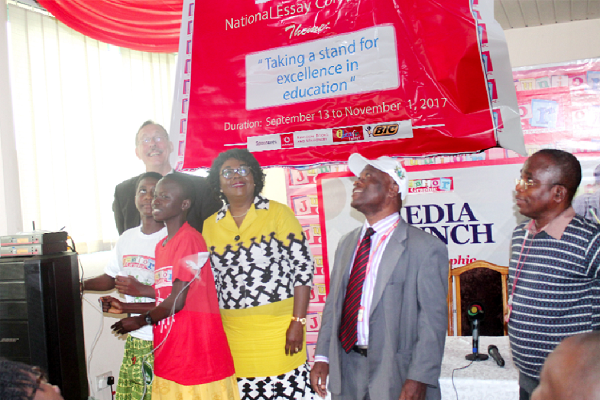  Mr Kwabena Baah-Adade (2nd right), Acting Managing Director, Graphic Communications Group Ltd (GCGL), Mr Yaw Boadu Ayeboafo (right), Director, Newspapers, GCGL, Mrs Mavis Kitcher (3rd right), Editor, Junior Graphic, Dr James Dobson (left), Education Office Director, Office of Education, USAID Ghana, together with students of the St Joseph's R/C Basic School and Additrom School launching the Junior Graphic National Essay Competition in Accra yesterday.   Picture: EDNA ADU-SERWAA