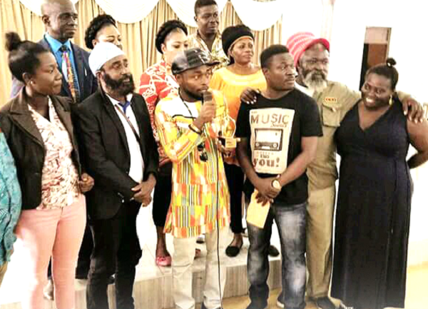  Joe Wizzy (in kente shirt) holding the award. With him are some members of G.M.A.