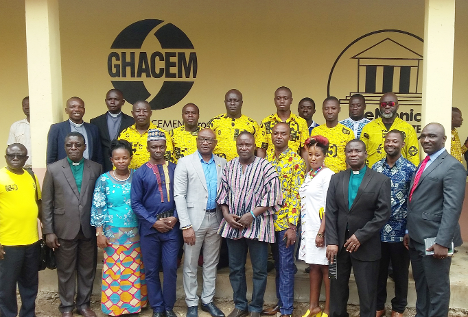• Officials of Ghacem and Clemonic Company with staff of the Methodist JHS A