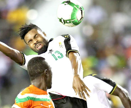 Kwame Kizito, who scored Ghana’s opening goal, wins an aerial batle with an opponent.