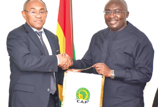  Dr Ahmad presenting a CAF pennant to Dr Mahamudu Bawumia at the Flagstaff House